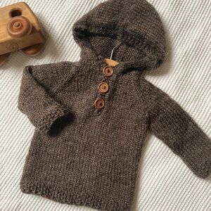 Handmade Cozy Brown Knit Baby Sweater with Hood and wooden buttons